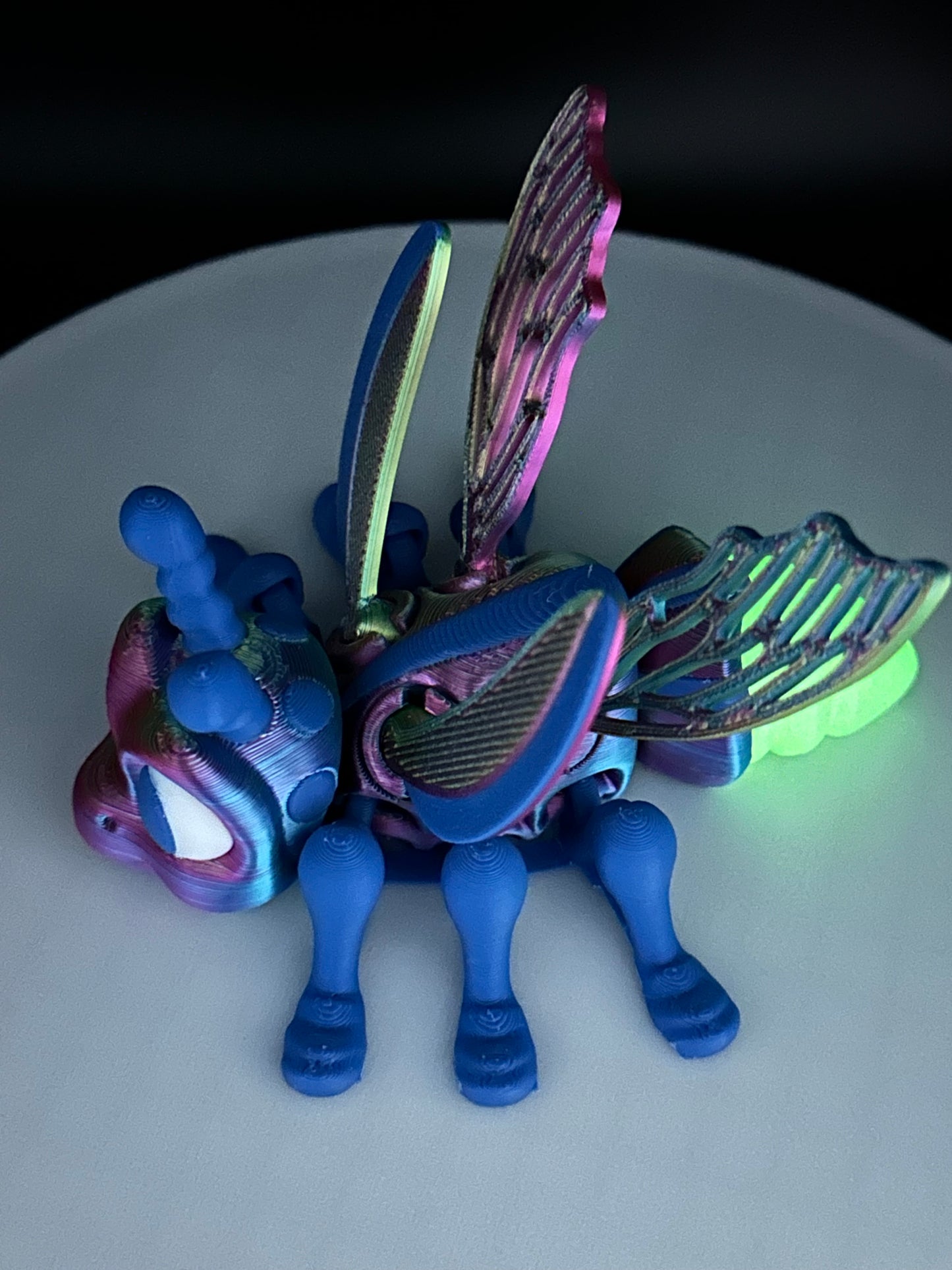 Adorable Flexi Firefly figurine features a glowing in the dark tail