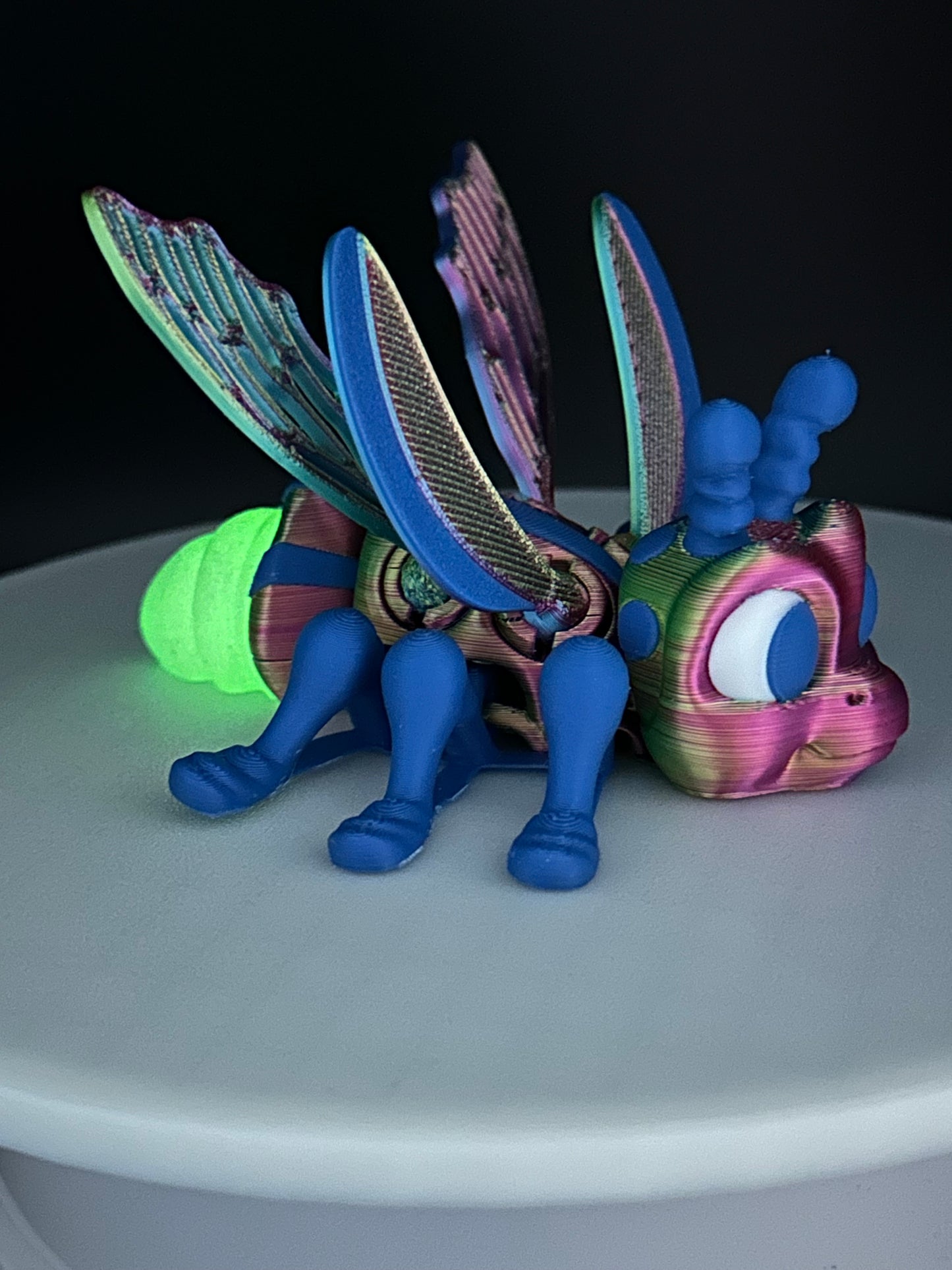 Adorable Flexi Firefly figurine features a glowing in the dark tail